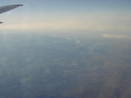Foothills of the Sierra Nevada (looking towards Yosemite National Park in the distance)<br>Location: <a href="https://www.google.com/maps/search/?api=1&query=38.10322,-120.36922" target="_new">Over California</a>
